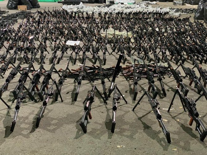 The photos showed large quantities of weapons, such as night and day binoculars, drone-guiding systems, remote detonation electrical parts and dozens of sniper rifles.