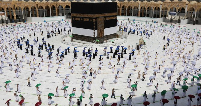 Hajj began on Wednesday as pilgrims began their journey from the Grand Mosque in Makkah amid strict safety rules. (AFP)