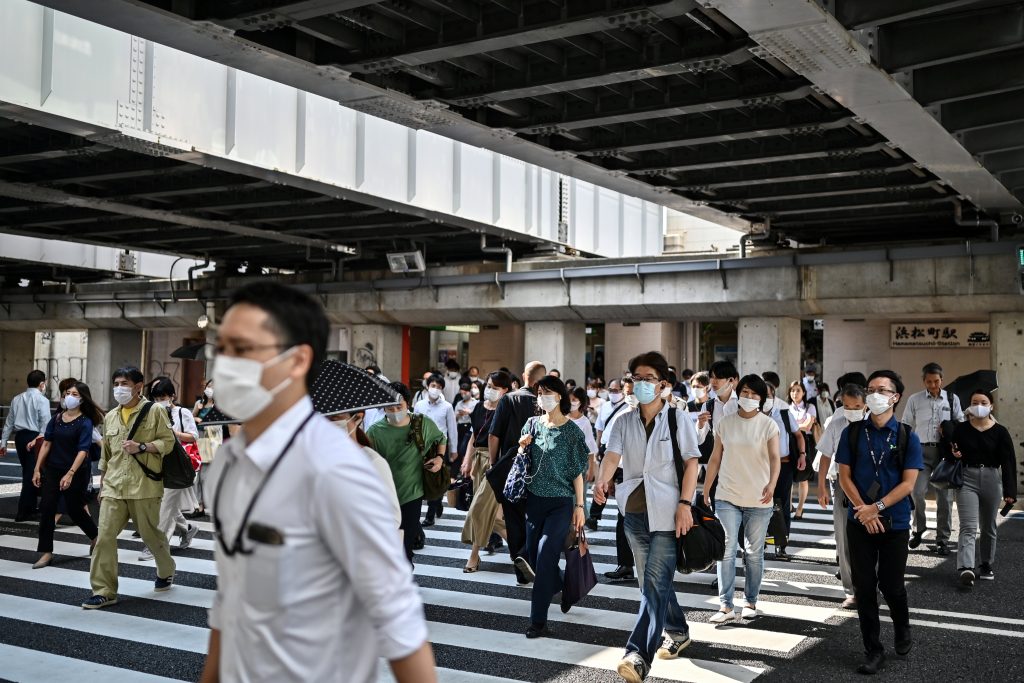 Japanese economic activity, including private consumption, is recovering after the government fully lifted the state of emergency in late May. (AFP)