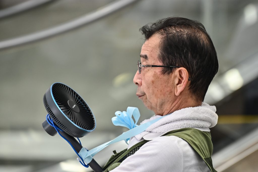 At least 100 people have been taken to hospital by ambulance due to heatstroke per day since Aug. 9, including 339 on Monday. (AFP)