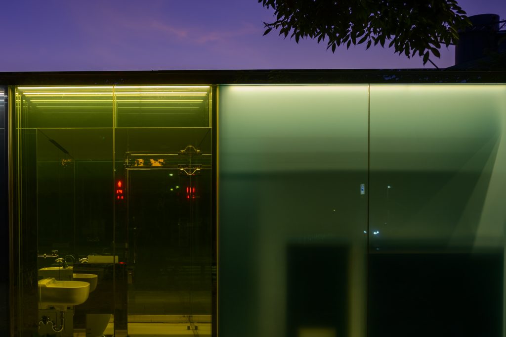 A general view of a transparent toilet designed by Shigeru Ban, which its outer walls of glass would turn opaque when the lock is closed, is seen at Haru-no-Ogawa Community Park in the Shibuya district of Tokyo on August 19, 2020. (AFP)