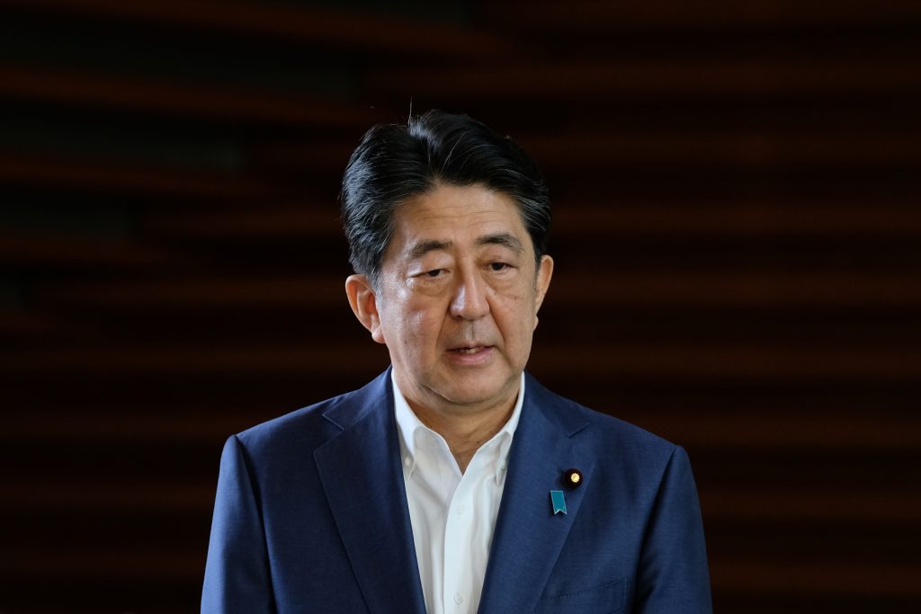 Japanese Prime Minister Shinzo Abe has battled ulcerative colitis for years, and said on Friday that he will resign. (AFP)