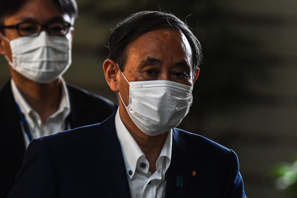 Suga, 71, conveyed his intention to run for the Liberal Democratic Party presidency to LDP Secretary-General Toshihiro Nikai in a meeting on Saturday. (AFP)