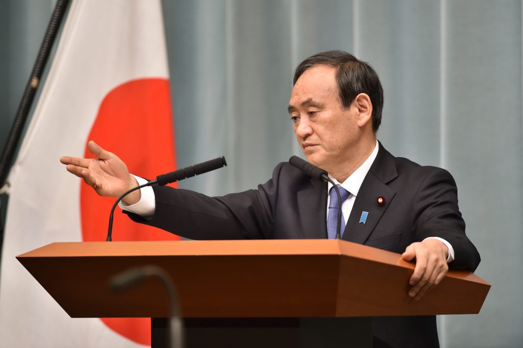 Japan's Chief Cabinet Secretary Yoshihide Suga in a press conference at the prime minister's official residence in Tokyo on Jan. 25, 2015. (AFP)
