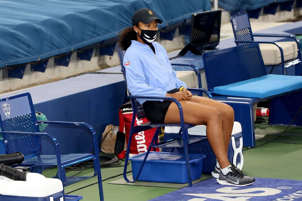 Naomi Osaka of Japan waits for the trophy ceremony to begin during the Western & Southern Open at the USTA Billie Jean King National Tennis Center, where she withdrew from the match against Victoria Azarenka of Belarus before play, Aug. 29, 2020. (File photo/AFP)