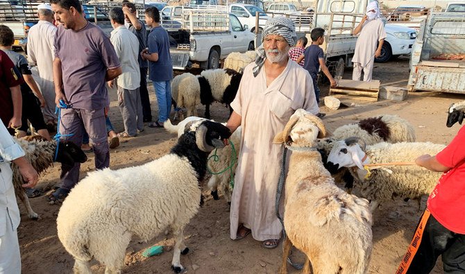 People visit a livestock market in Misrata, Libya. (Reuters)