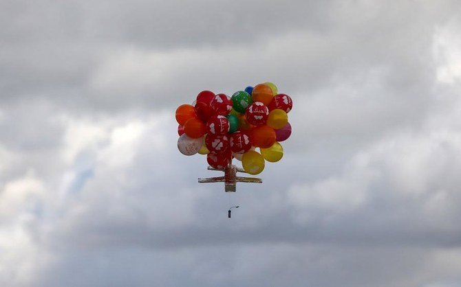 Israeli media reported that more than 30 fires were set around border communities by balloons carrying incendiary devices launched from Gaza. (File/AFP)