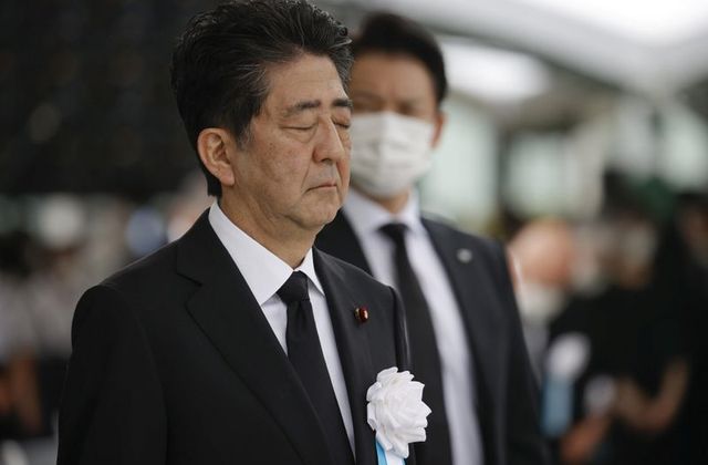Shinzo Abe offers a silent prayer for the victims of the 1945 atomic bombing, at Peace Memorial Park in Hiroshima, Japan, August 6, 2020. (Reuters)