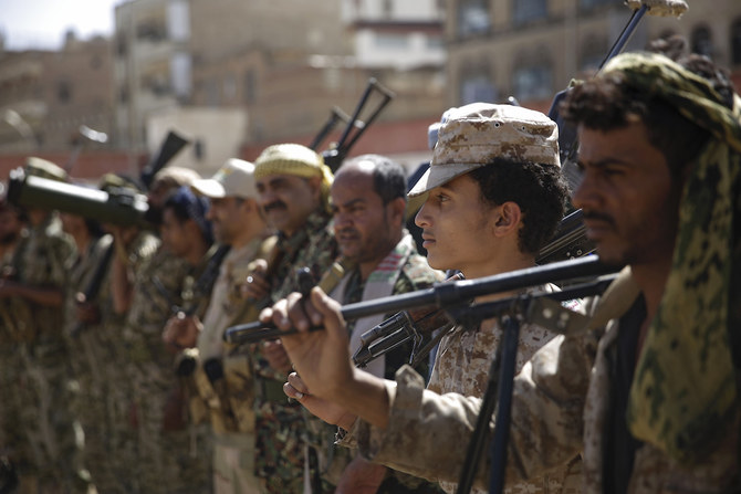 In this Feb. 20, 2020 file photo, Houthi rebel fighters display their weapons during a gathering aimed at mobilizing more fighters for the Iranian-backed Houthi movement, in Sanaa, Yemen. (AP)