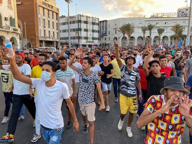 Libyans chant slogans during a demonstration due to poor public services at the Martyrs' Square, Tripoli. (AFP)