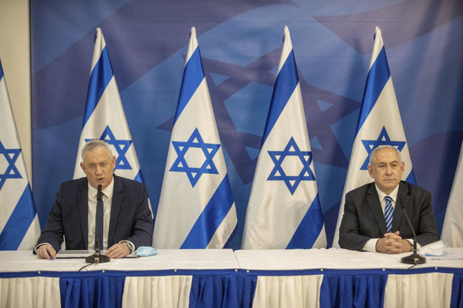 Israeli Prime Minister Benjamin Netanyahu, right, and Israeli Defense Minister Benny Gantz issue a statement at the Israeli Defense Ministry in Tel Aviv, Israel, July 27, 2020. (AP Photo)