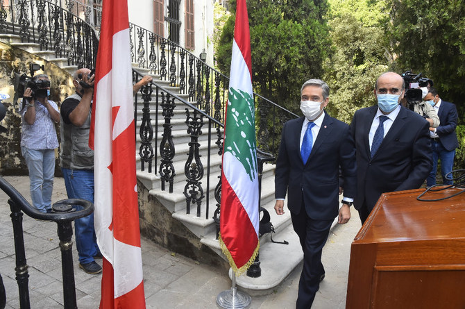 Lebanese Foreign Minister Charbel Wehbe meets with Canadian Foreign Minister Francois-Philippe Champagne on Aug. 27, 2020 outside the Lebanese foreign ministry in Beirut. (Dalati Nohra via AP)