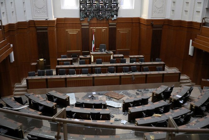Debris litters the floor of the Lebanese Parliament hemicycle in the central district of the capital Beirut, on August 5, 2020, in the aftermath of a massive explosion in the city's port. (AFP)