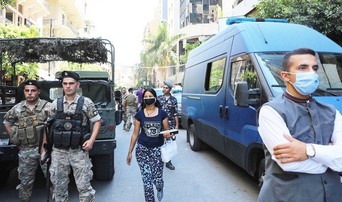 Lebanese soldiers and security officers stand guard in downtown Beirut on August 25, 2020. (AFP)