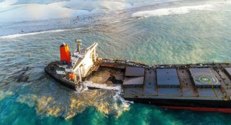 An aerial view taken on August 15, 2020 shows the vessel MV Wakashio, belonging to a Japanese company but Panamanian-flagged that had run aground near Blue Bay Marine Park, Mauritius three weeks ago. (AFP)