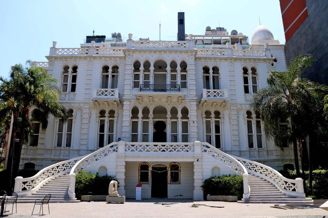 The facade of the damaged Sursock Museum in the neighbourhood of Ashrafiyeh with empty windows can be seen after their stained glass was broken in the aftermath of the massive blast at the port of Beirut which ravaged entire neighbourhoods of the city. (AFP)