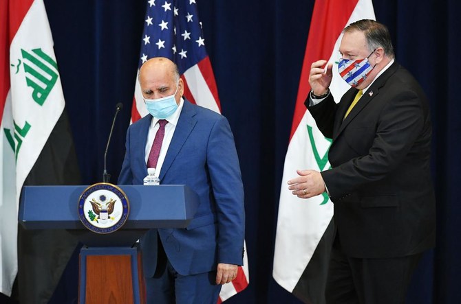 US Secretary of State Michael Pompeo (right) and Iraq's Foreign Minister Fuad Hussein arrive for a press conference at the State Department in Washington, DC on August 19, 2020. (AFP)