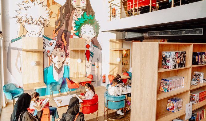 Visitors to the cafe can order their drinks and browse Akiba’s collection for free at diner-style tables, or enjoy their experience solo as they catch up on their favorite manga tales. (AN photo by Huda Bashatah)