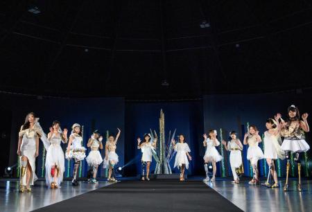 Women with prostheses display creations by designer Makiko Sugawa during the Amputee Venus fashion show in Tokyo on Tuesday. (AFP)