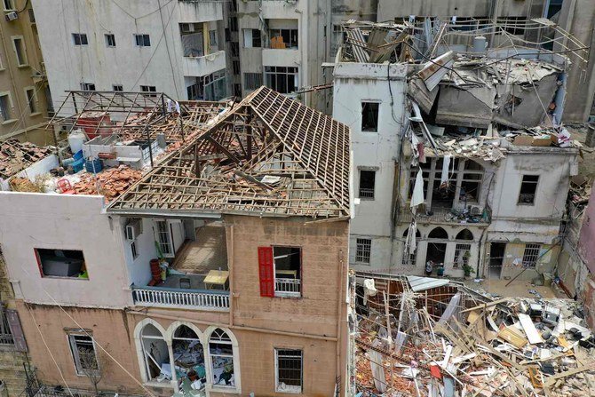 An aerial view shows damaged buildings in Beirut's neighbourhood of Gemayzeh, days after a huge chemical explosion hit the nearby port, devastating large parts of the Lebanese capital and claiming over 150 lives. (AFP)