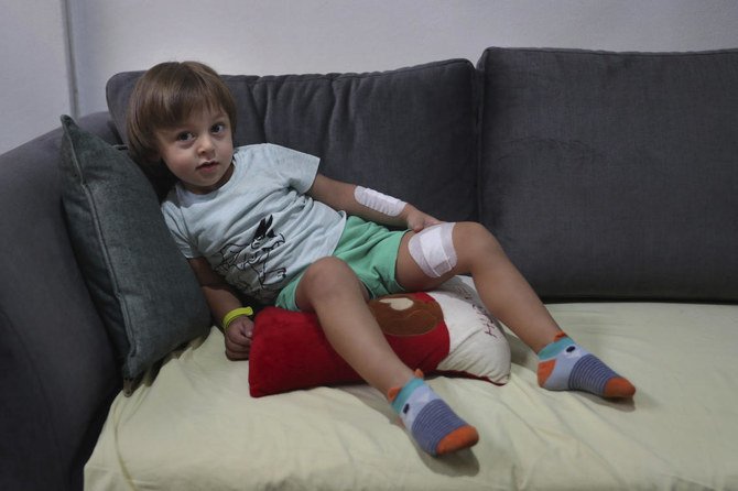 Three-year-old Abed Achi was playing with his Lego blocks when the huge blast ripped through Beirut, shattering the nearby glass doors. (AP)