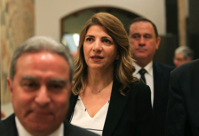 Lebanese Justice Minister Marie Claude Najm, center, cited the catastrophic Beirut explosion as her reason for resigning. (AFP file photo)