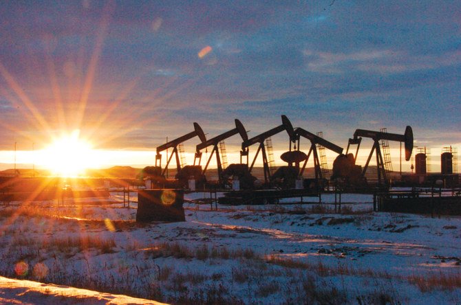Oil pump jacks are seen in McKenzie County, in western North Dakota. Over the past month, Brent crude oil has been trading in a range between $41 and almost $45. (AP/File )