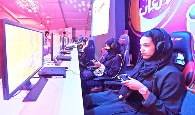 Gamers in the Kingdom want Saudi PlayStation Store to introduce services like its other regional counterparts offer. (AFP/Reuters)