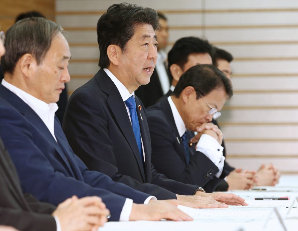 Japanese Prime Minister Shinzo Abe ordered ministers to take early actions, working closely with municipalities and related institutions while making sure to send out information to citizens in a swift and easy-to-understand way. (AFP)
