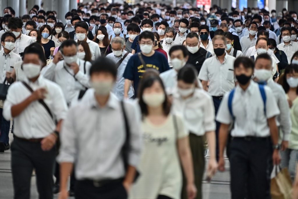 Tuesday's new cases included 59 people in their 20s or 30s, 34 in their 40s and 55 in their 50s or older. (AFP)