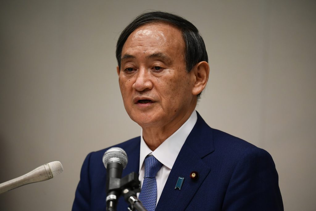 Japan's chief cabinet secretary Yoshihide Suga attends a press conference to announce his candidacy for the Liberal Democratic Party (LDP) leadership in Tokyo on September 2, 2020. (AFP)
