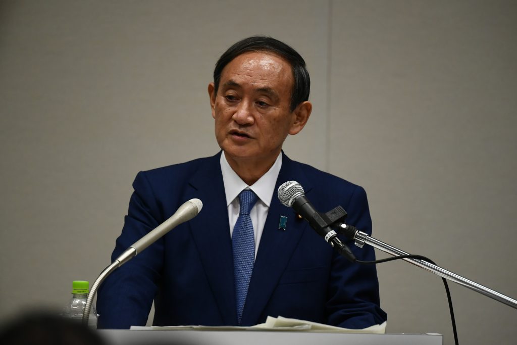 Suga, Japan's chief cabinet secretary, said he would continue to focus on revitalising regional economies, which he described as among key pillars of 