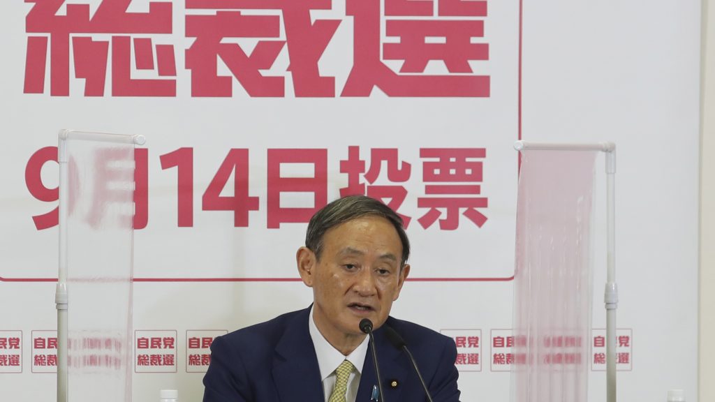 Japan's Chief Cabinet Secretary Yoshihide Suga (C) speaks during a news conference at the ruling Liberal Democratic Party headquarters in Tokyo, Sep. 8, 2020. (AFP)