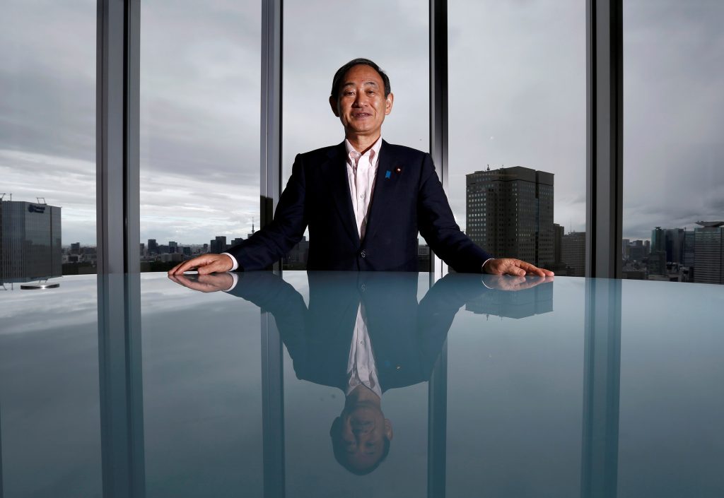 Japan's Chief Cabinet Secretary Yoshihide Suga poses for a photograph during a Thomson Reuters Newsmaker event in Tokyo, Japan, Aug. 30, 2016. (File photo/Reuters)