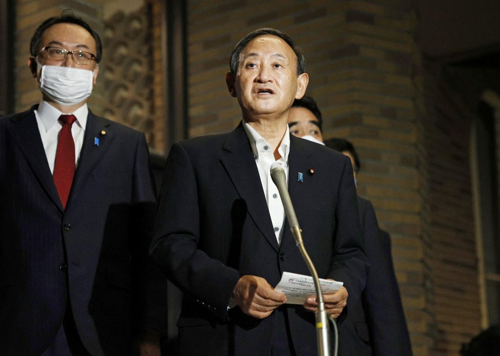 Japanese Prime Minister Yoshihide Suga meets the press at the prime minister's official residence after speaking on the phone with U.S. President Donald Trump at their first conversation since Suga took office, in Tokyo, Japan, in this photo taken by Kyodo September 20, 2020. (Kyodo/via REUTERS) 