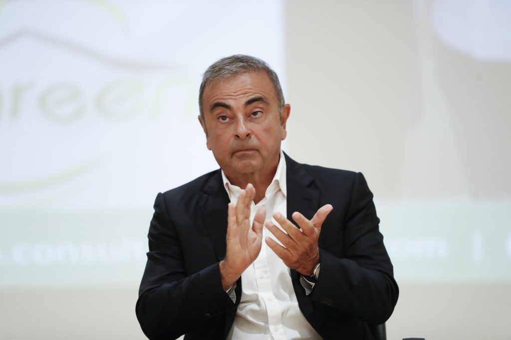 Nissan's former executive Carlos Ghosn attends a press conference at the Holy Spirit University of Kaslik (USEK), north of Beirut, Lebanon, Tuesday, Sept. 29, 2020. Ghosn was arrested in Japan in 2018, and was awaiting trial on charges of under-reporting future income and breach of trust when he jumped bail and escaped to Lebanon late last year. The Brazilian-born Frenchman has Lebanese citizenship. (AP Photo)