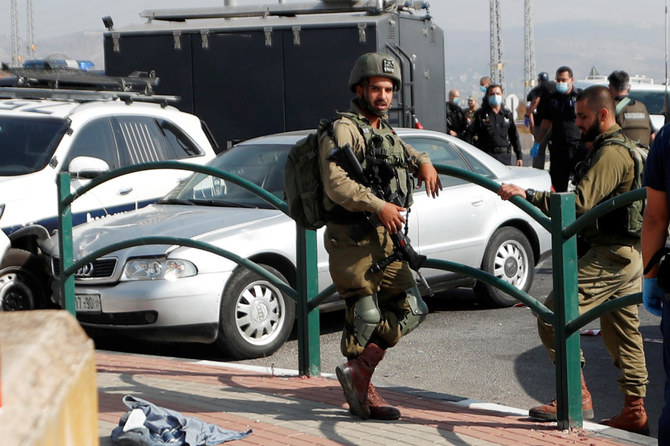 Israeli forces secure the scene of an incident at Tapuach junction in the Israeli-occupied West Bank September 2, 2020. (Reuters)