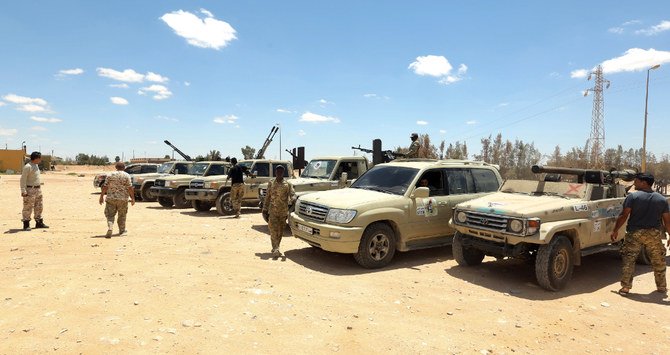 Fighters loyal to the UN-recognised Libyan Government of National Accord (GNA) secure the area of Abu Qurain, half-way between the capital Tripoli and Libya's second city Benghazi. (AFP/File)