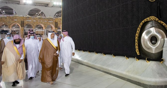 Prince Khalid bin Faisal helped to wash the Kaaba on behalf of King Salman. (SPA)