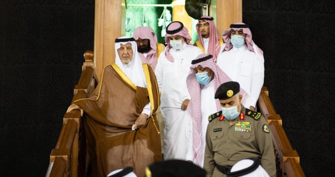 Prince Khalid bin Faisal helped to wash the Kaaba on behalf of King Salman. (SPA)