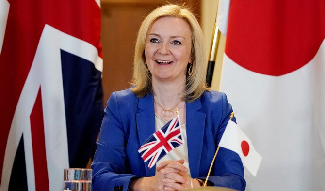In this file photo taken on June 09, 2020 A handout image released by 10 Downing Street, shows Britain's International Trade Secretary Liz Truss during a video conference call with Japan's Foreign Minister Toshimitsu Motegi, as they formally begin negotiations on a free trade agreement, at the Department for International Trade in London on June 9, 2020. (AFP)