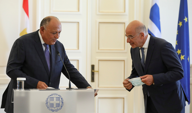 Egyptian Foreign Minister Sameh Shoukry and his Greek counterpart Nikos Dendias after making a joint statement in Athens on Tuesday. (Reuters)