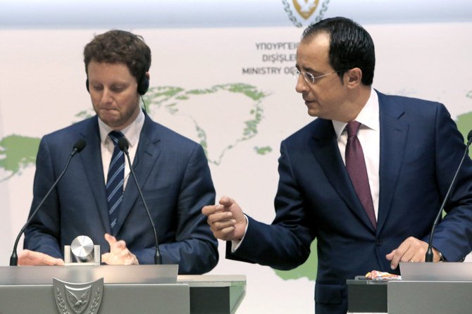 France's Minister for European Affairs Clement Beaune, left, and Cyprus' Foreign Minister Nikos Christodoulides take part in a news conference at the Foreign Ministry building in Nicosia on Sept. 18, 2020. (AP Photo/Petros Karadjias)