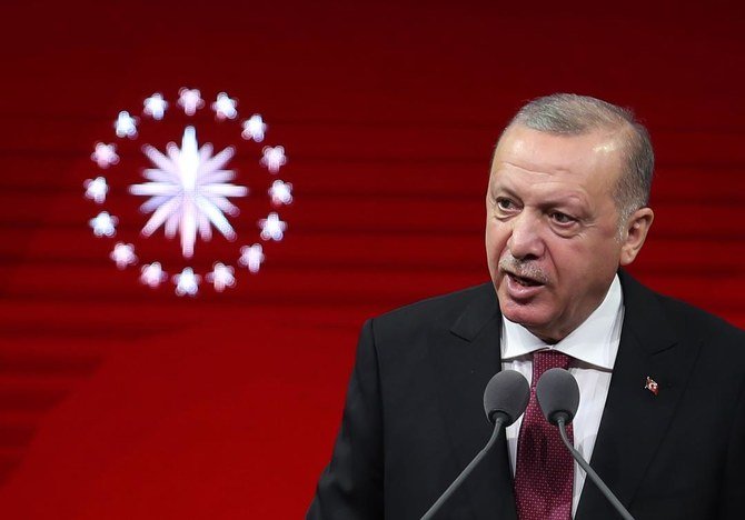 Turkish President Recep Erdogan has had talks with EU Council president Charles Michel and German Chancellor Angela Merkel, who is seeking to ease the crisis. (AFP)