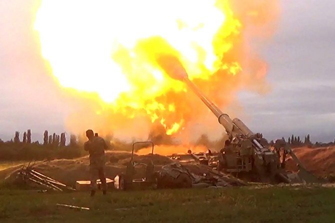 An image grab taken from a video made available on the official web site of the Azerbaijani Defence Ministry on September 28, 2020, allegedly shows Azeri artillery strike towards the positions of Armenian separatists in the breakaway region of Nagorno-Karabakh. (File/AFP)