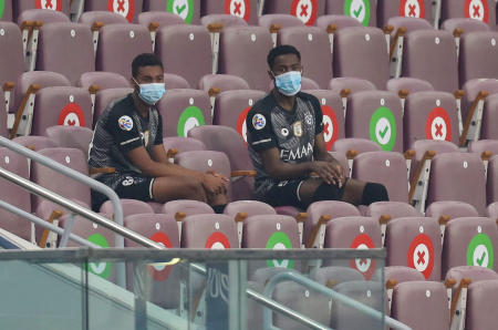Al Hilal's bench players are pictured ahead of their AFC Champions League group B match against UAE's Shabab Al-Ahli on September 23, 2020, at the Khalifa International Stadium in the Qatari capital Doha. Match officials called the match off after the Saudi team failed to field the minimum required 13 players. Al-Hilal managed only 11 players including 3 goalkeepers. (AFP)