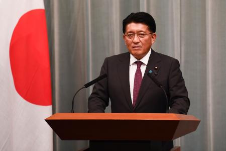Newly appointed Japan's Minister in charge of digital reform Takuya Hirai delivers a speech during a press conference at the Prime Minister's office in Tokyo on September 17, 2020. (AFP)