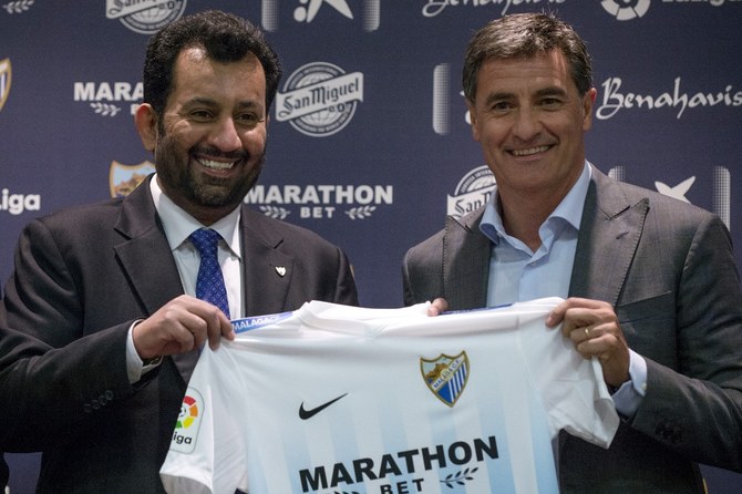 Sheikh Abdallah Al-Thani (left) at the Rosaleda stadium in Malaga, on March 8, 2017. (AFP/file)