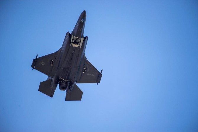 A F-35 fighter plane flies over the White House on June 12, 2019, in Washington, D.C. (AFP)