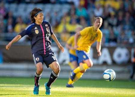In this file photo taken on June 20, 2012 Japan's Yuki Nagasato (left) controls the ball during the three nations women's soccer tournament at Gamla Ullevi stadium in Gothenburg, Sweden. (AFP)